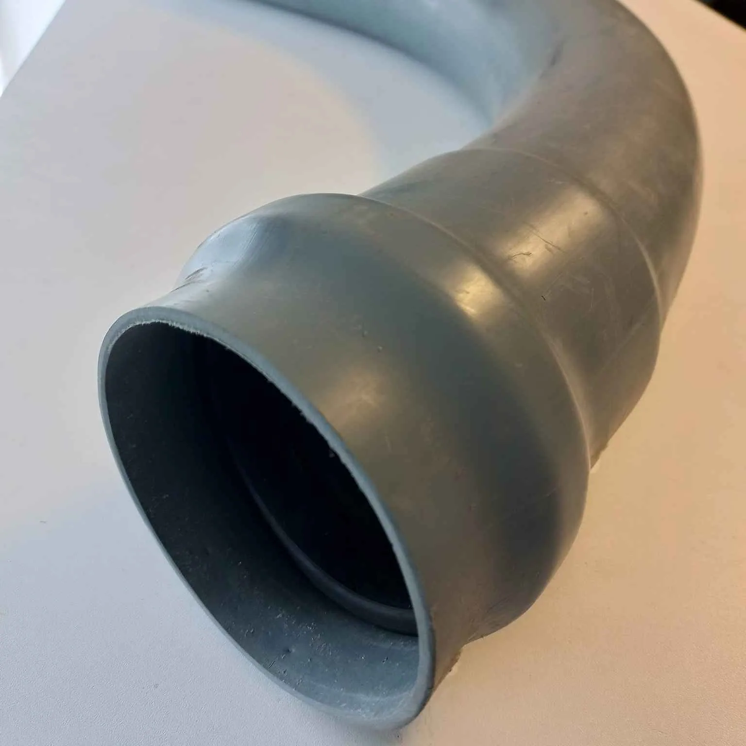 CODO PRESION UZ TERMOFORMADO 200MM X 45 1.25 Mpa. LARGO RADIO