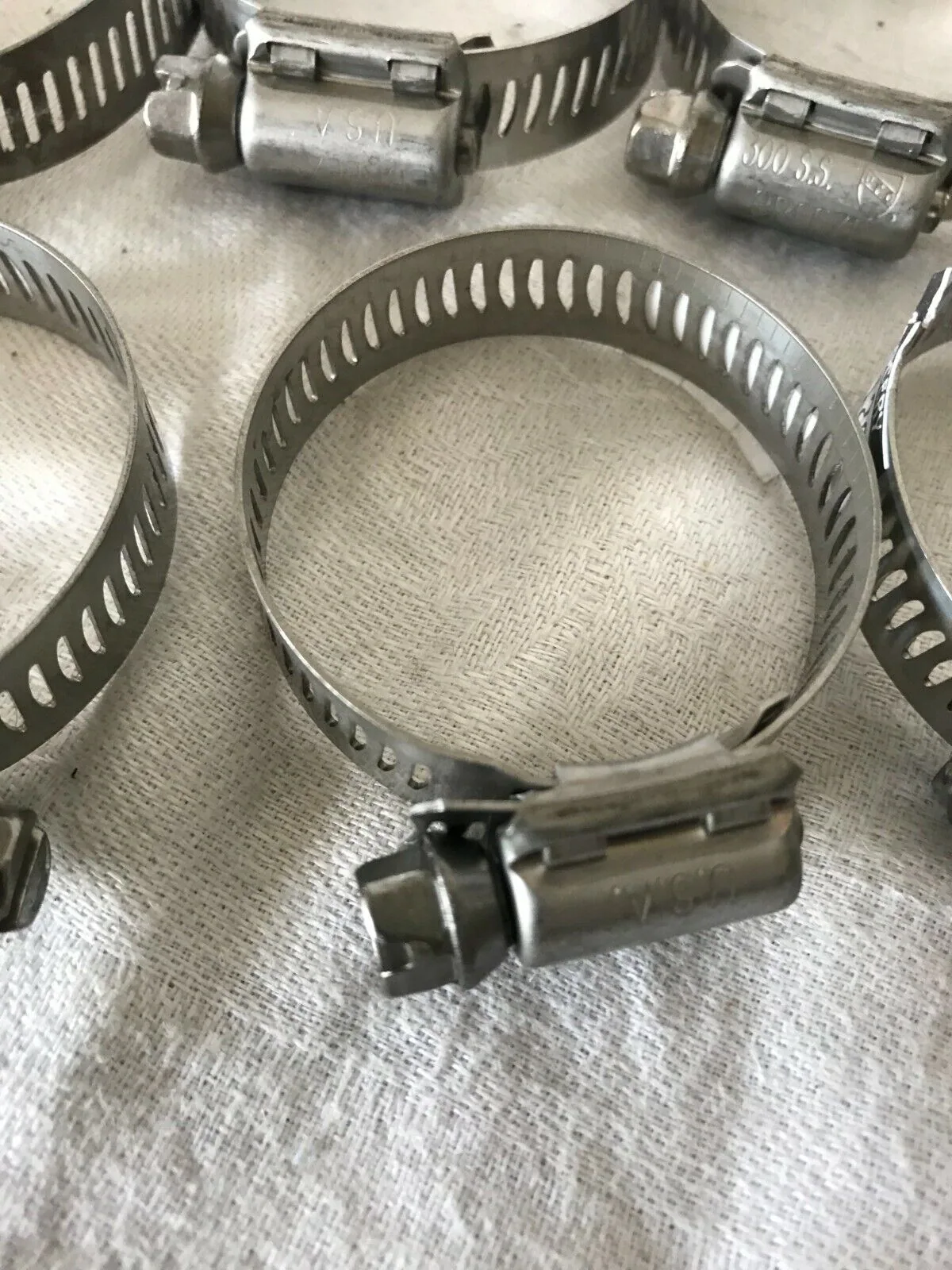 ABRAZADERA DE CREMALLERA FLEJE 9MM ACERO INOXIDABLE DIN 3017 3/4" *