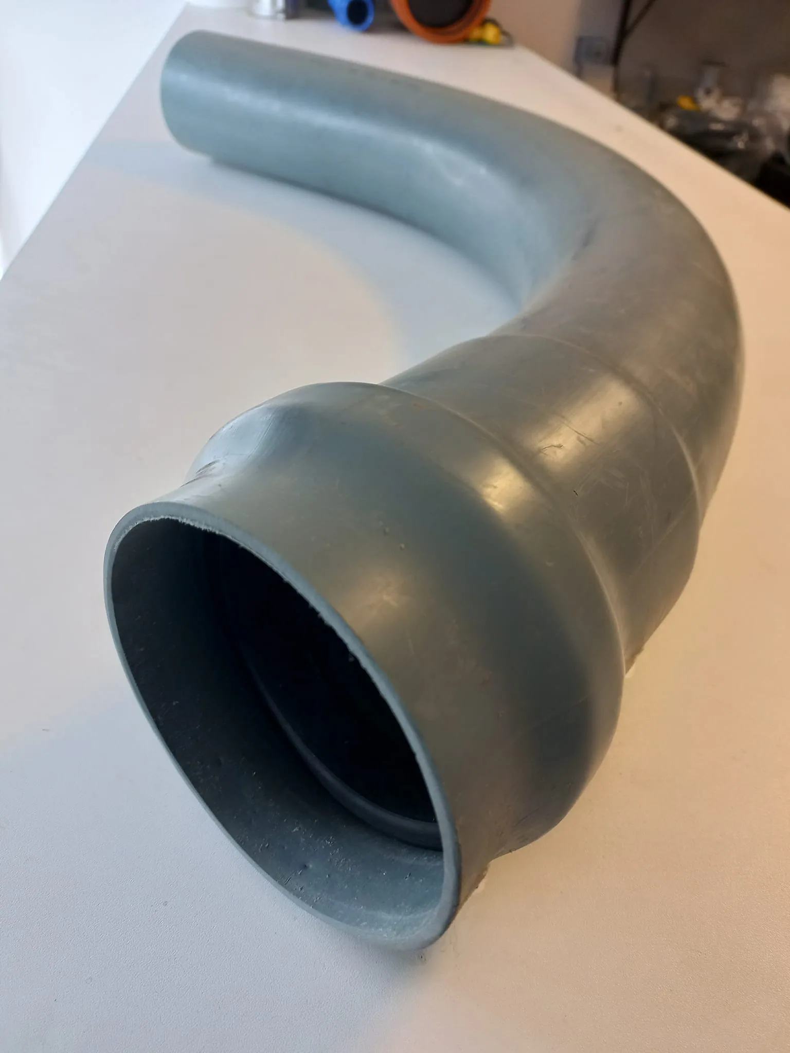 CODO PRESION UZ TERMOFORMADO 90MM X 45 1.25MPA LARGO RADIO
